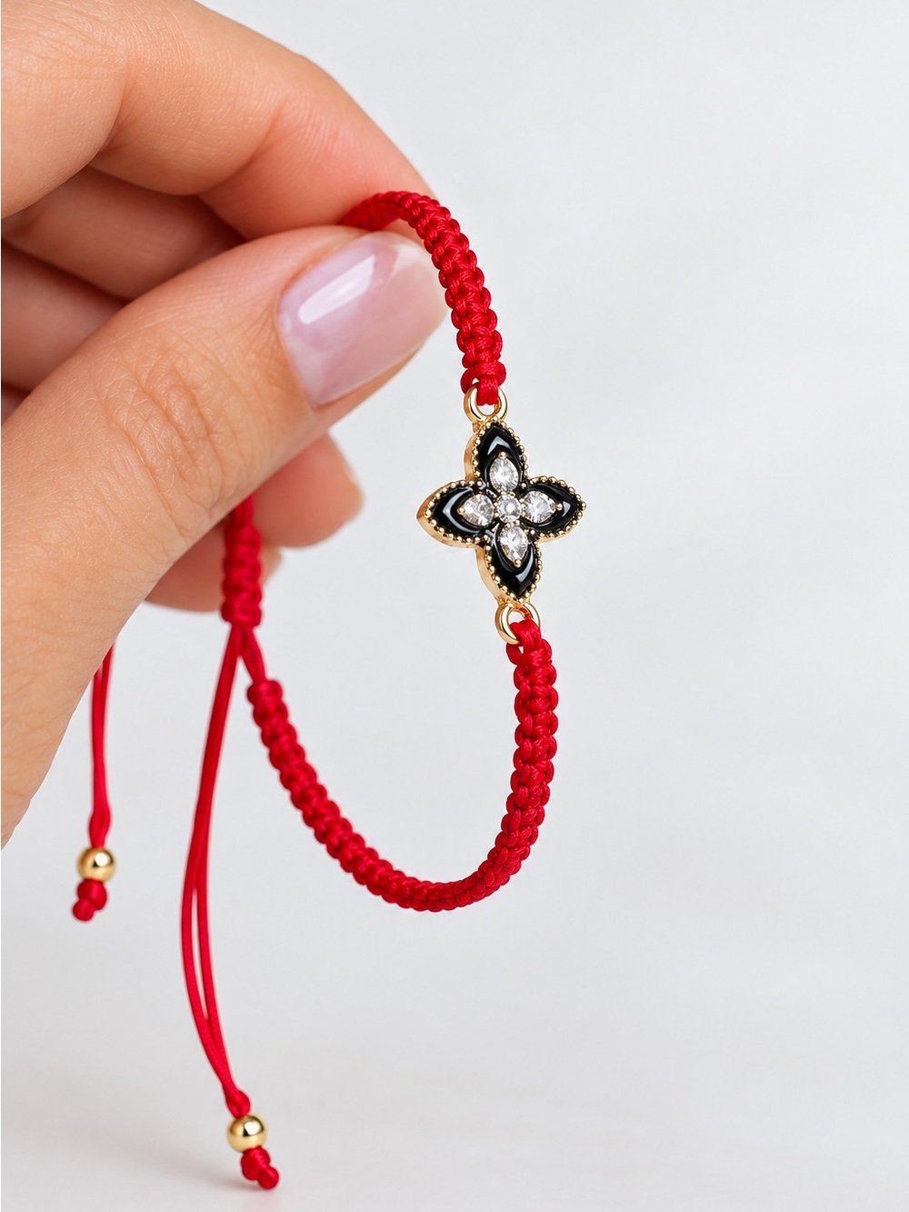 Red Braided Cord Bracelet with Gold & Black Clover Charm